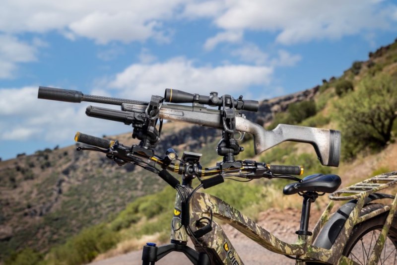 hunting-rifle-with-scope-suppressor-stock-mounted-on-apex-pro-e-bike.jpg